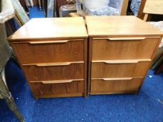 A pair of retro style bedside cabinets