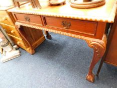 A Victorian style mahogany hall table with pie cru