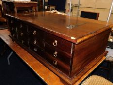 A unusual solid wood coffee table set with hinged