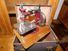 A boxed small sewing machine