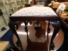 A mahogany piano stool with ball & claw feet twinned with a small circular table a/f