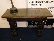 An 18thC. green marble topped side table on pillar