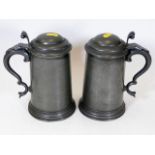 A pair of 19thC. lidded pewter tankards