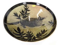 A large studio pottery bowl with armadillo figure