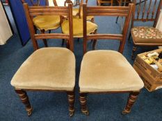 A pair of oak framed upholstered chairs