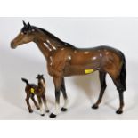 A Beswick stallion & foal