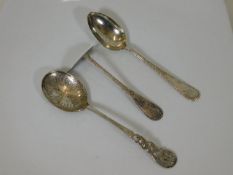 A silver pusher, a decorative silver spoon & one o