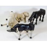 Four 1920’s Schoenhut animals comprising two donke