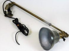 A vintage brass machinists lamp