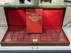 A boxed set of pewter ingots commemorating British