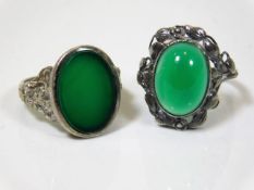Two white metal rings set with jade & chalcedony