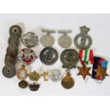 A quantity of medals, badges & other items