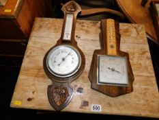 Two oak mounted barometers