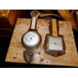 Two oak mounted barometers