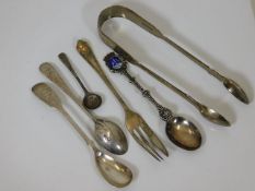 A set of silver tongs twinned with five silver & w