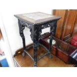 A c.1900 Chinese hardwood table with marble inlay