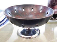 A stylish art deco bakelite bowl with chrome foot