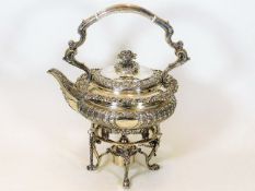 An ornate early 20thC. silver spirit kettle with burner & stand approx. 2050 gms