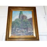 A framed oil of continental street scene signed G.