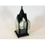 An early 20thC. gothic style candle holder lamp wi