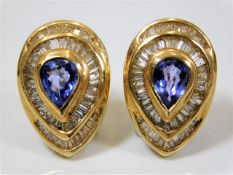 A pair of substantial teardrop shaped 14ct gold tanzanite & diamond earrings each measuring 25mm x 1