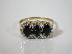 A 9ct gold sapphire & diamond ring 2.5g