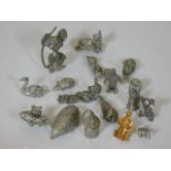 A quantity of metal animal figures