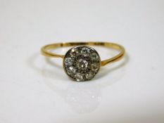 An antique 18ct daisy ring 12g
