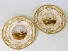 A pair of hand painted Coalport game bird plates s