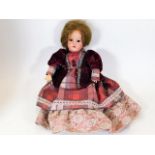 An Armand Marseille doll marked DRGM 246/1