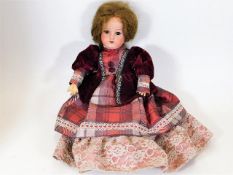 An Armand Marseille doll marked DRGM 246/1