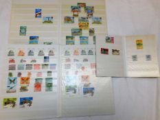 Three world stamp albums including Middle East
