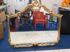 A large decorative Victorian style gilt mirror