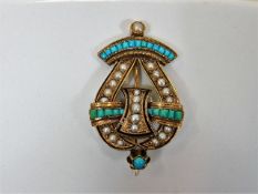 An antique French 18ct gold brooch set with natura