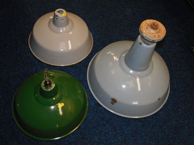 Three enamelled industrial light fittings