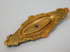 A 9ct gold brooch set with diamond 3.1g