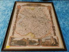 A framed linen map of Shropshire