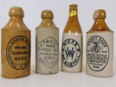 Four stoneware bottles including a J. Philipps of