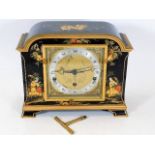 An Elliott of London lacquered mantle clock of Chi