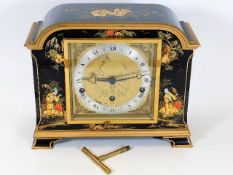An Elliott of London lacquered mantle clock of Chi