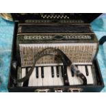 A Russian accordion with case