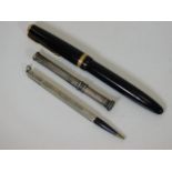 A Parker fountain pen & to white metal pencils
