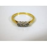 An 18ct gold diamond trilogy ring 3g