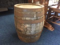 A distressed coopered barrel