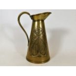 An art nouveau brass jug 8.75in high