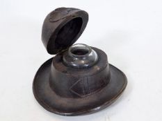 A c.1900 Black Forest style inkwell hat