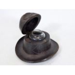 A c.1900 Black Forest style inkwell hat