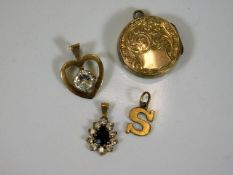 Four gold 9ct pendants 5g