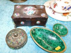 An arts & crafts style box with enamelled roundels