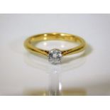 An 18ct gold solitaire ring set with 0.25ct of diamond 2.7g with Bakelite box